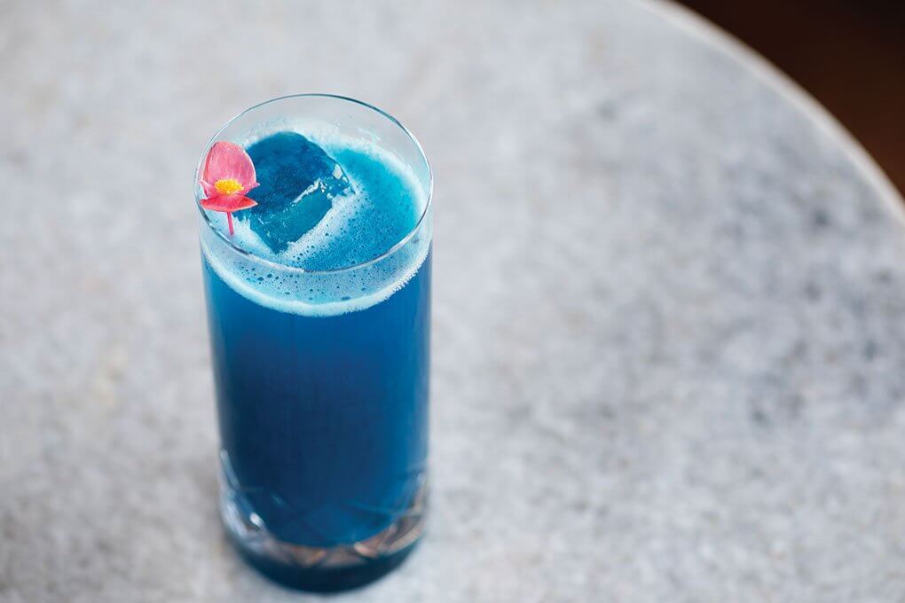 Clarified milk punch, lemon, Blue Majik pineapple juice, blue algae, Bacardi 4-Year, cinnamon bark cordial