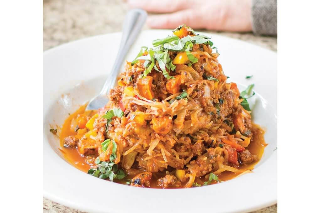 Spaghetti squash “noodles,” marinara sauce with chipotle pepper, roasted vegetables, ground beef