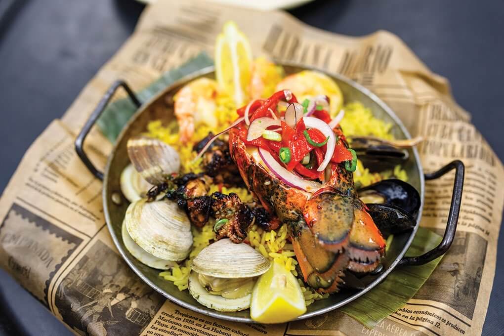 Jumbo shrimp, Maine lobster tail, littleneck clams, mussels, mahi-mahi, squid, baby octopus, saffron rice, piquillo pepper salad