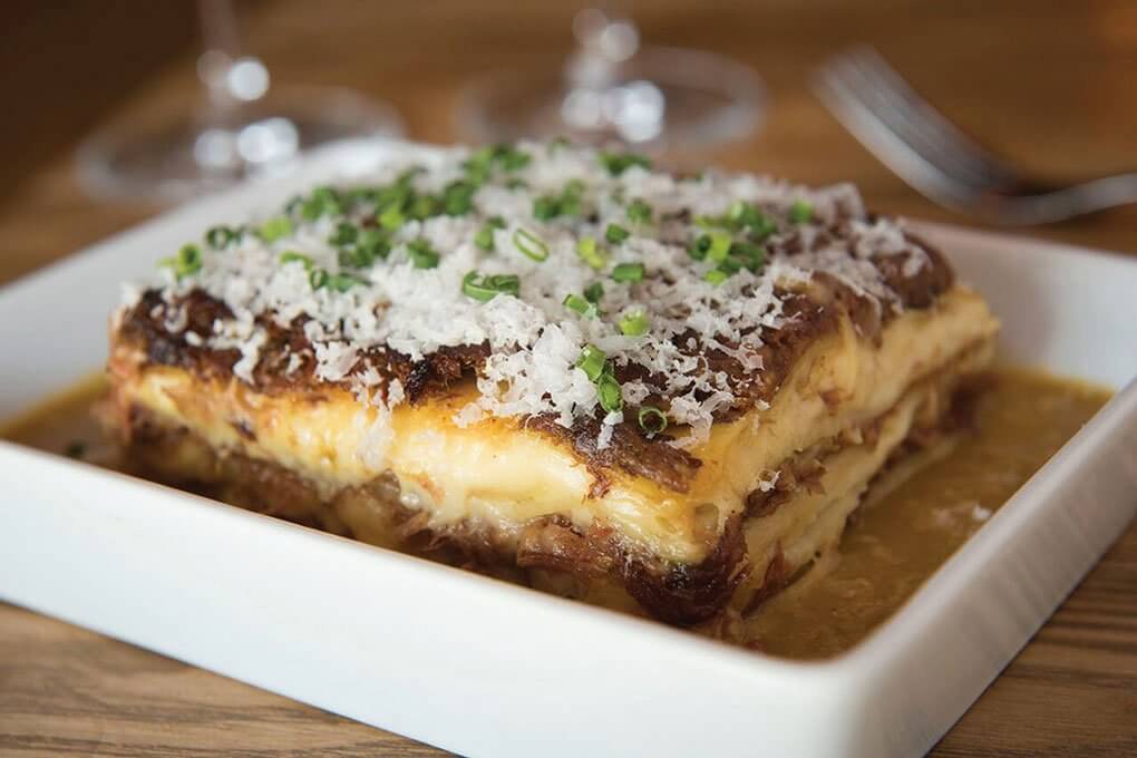 Short Rib & Taleggio Lasagna with béchamel, Savoy cabbage and caramelized onions