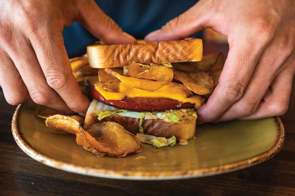 Griddled bologna, Texas toast, lettuce, American cheese, Dijonnaise, sea salt and housemade kettle chips