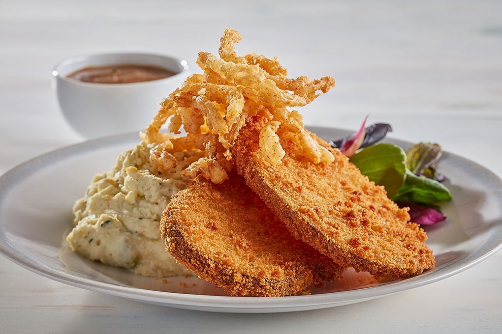 Crisp Idaho Potato Steak with Peppercorn Gravy and Poblano-Cheddar Idaho Yukon Gold Mashed Potatoes photo