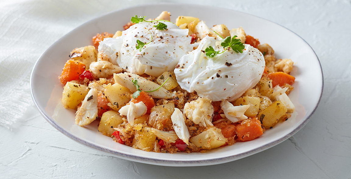 Idaho® Potato and Crab Hash with Poached Eggs