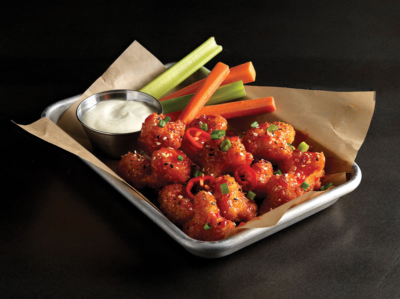 As part of its continued innovation push, Buffalo Wild Wings rolls out Cauliflower Zing Wings in September: cauliflower “wings” with ginger-soy garlic sauce, sesame seeds and pickled Fresno chiles.