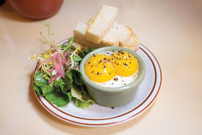 Hunky Dory’s Coddled Duck Eggs are set in rosemary cream and served with pain de mie toasts.