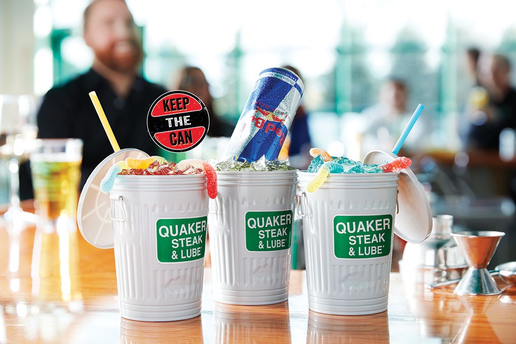 Quaker Steak & Lube brought back its branded Trash Can cocktails for its memorable and on-brand “Keep the Can” to-go initiative, which includes the Rummy Worm, a spin on the rum punch, and the Bull-dozer, a stiff drink with rum, vodka, gin, triple sec, peach schnapps, lemon sour mix and blue curaçao, topped with an upside-down can of Red Bull.