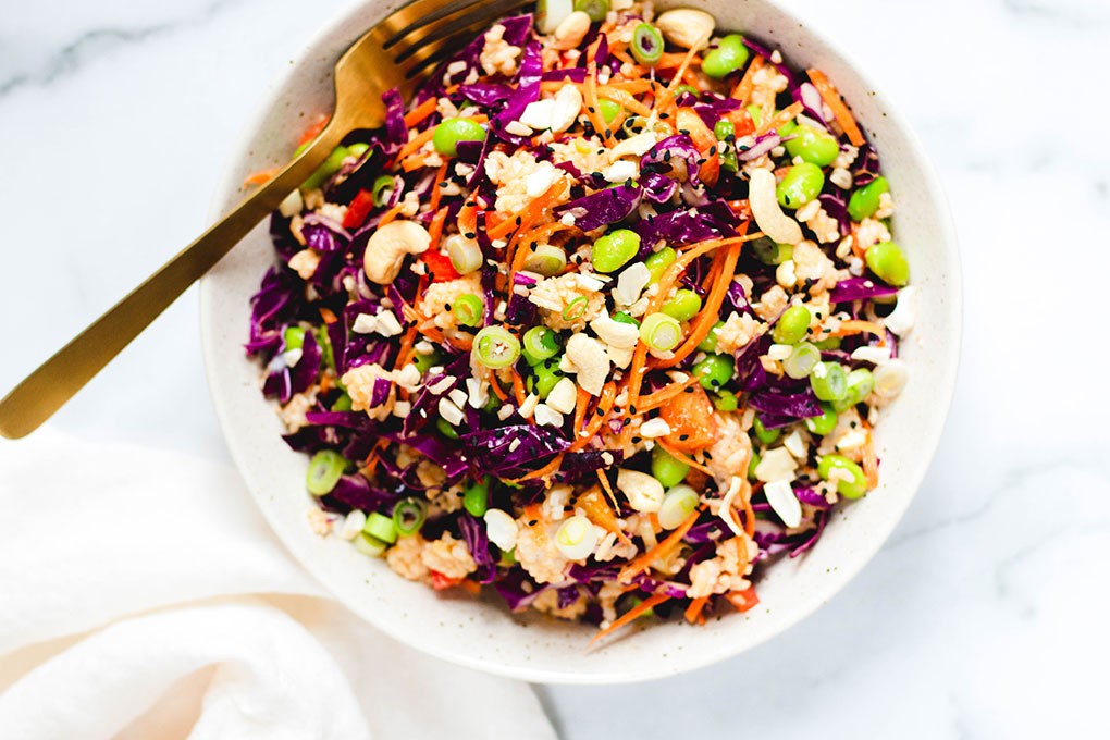 Bright, flavorful and functional, this Thai Peanut Crunch Rice Salad sees an aromatic base of U.S.-grown jasmine rice and a combination of edamame, peanuts, red bell pepper, red cabbage, carrots and scallion dressed in a ginger-maple peanut sauce.