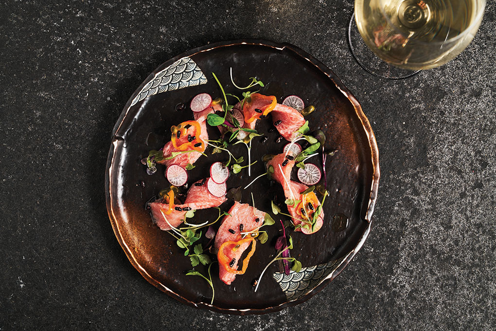Executive chef Joaquin Baca of Būmu in New York introduces striking color and fruity flavor with rings of habanada pepper scattered over his Tuna Tartare.