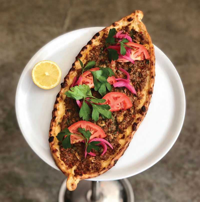 At Miami pop-up Pide Place, seasoned meat and chewy dough help make the Spiced Lamb Pide a best seller.