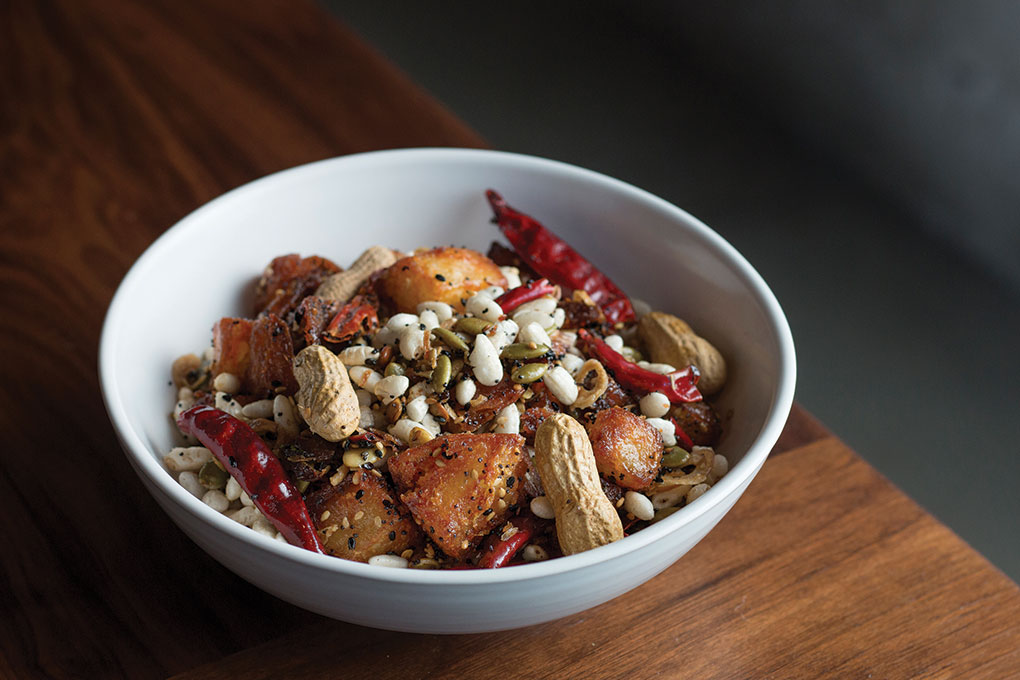 The Fried Butterball Potatoes at Majordomo in Los Angeles offer diners something new, tossed in a salsa seca that features nuts, seeds and chiles.