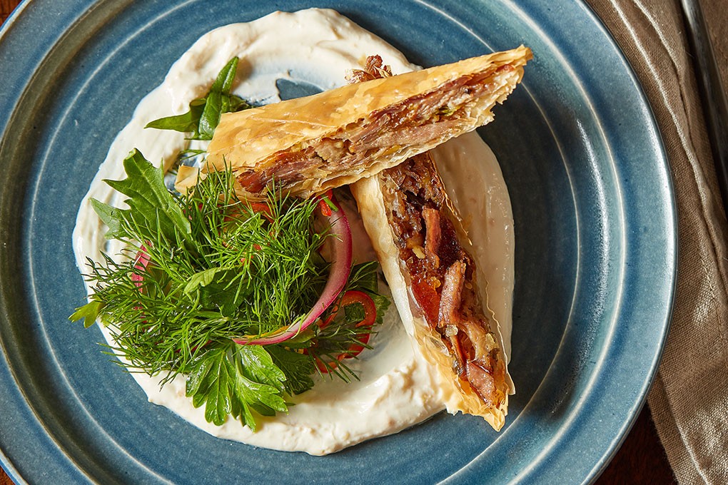 “This traditional Greek dish takes advantage of the clean, natural flavor of slow-cooked Aussie lamb,” says Chef George Pagonis. “It’s also a great way to use leftover roasted lamb, stretching the food cost even further. I add a bit of feta for saltiness, and enhance it with melting kefalograviera, which is like a Greek Gruyère.”