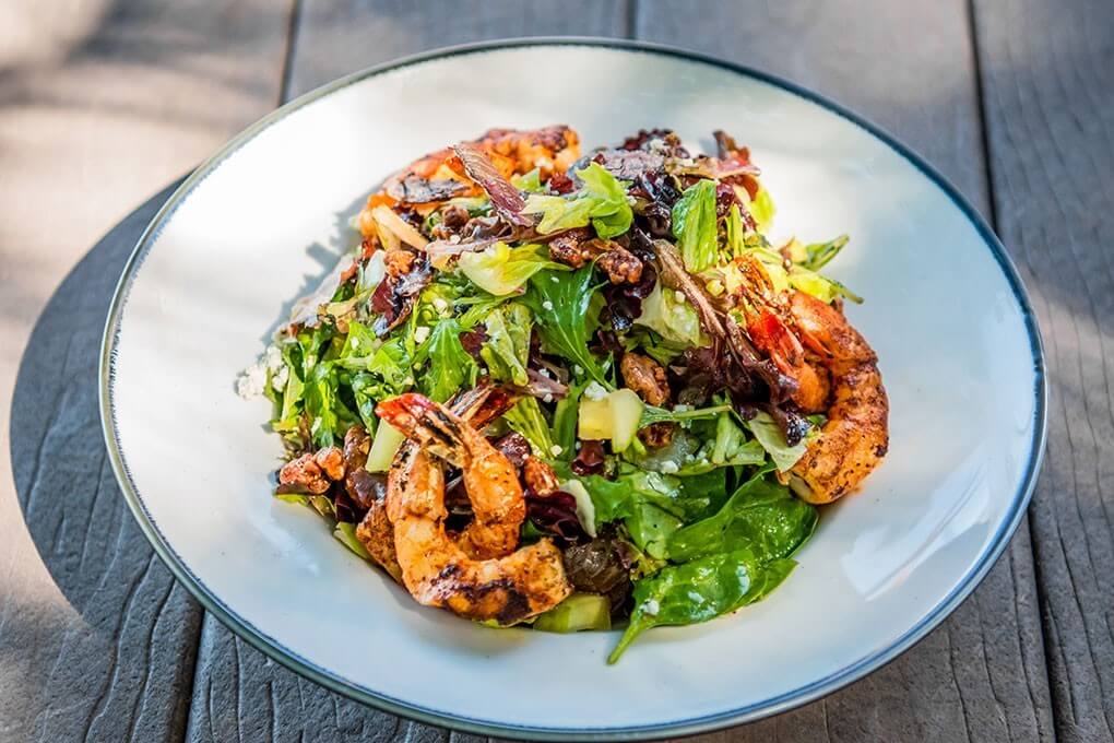 Spring mix topped with shrimp, apple, blue cheese, candied pecans, bacon crumbles and Tabasco-pepper jelly vinaigrette