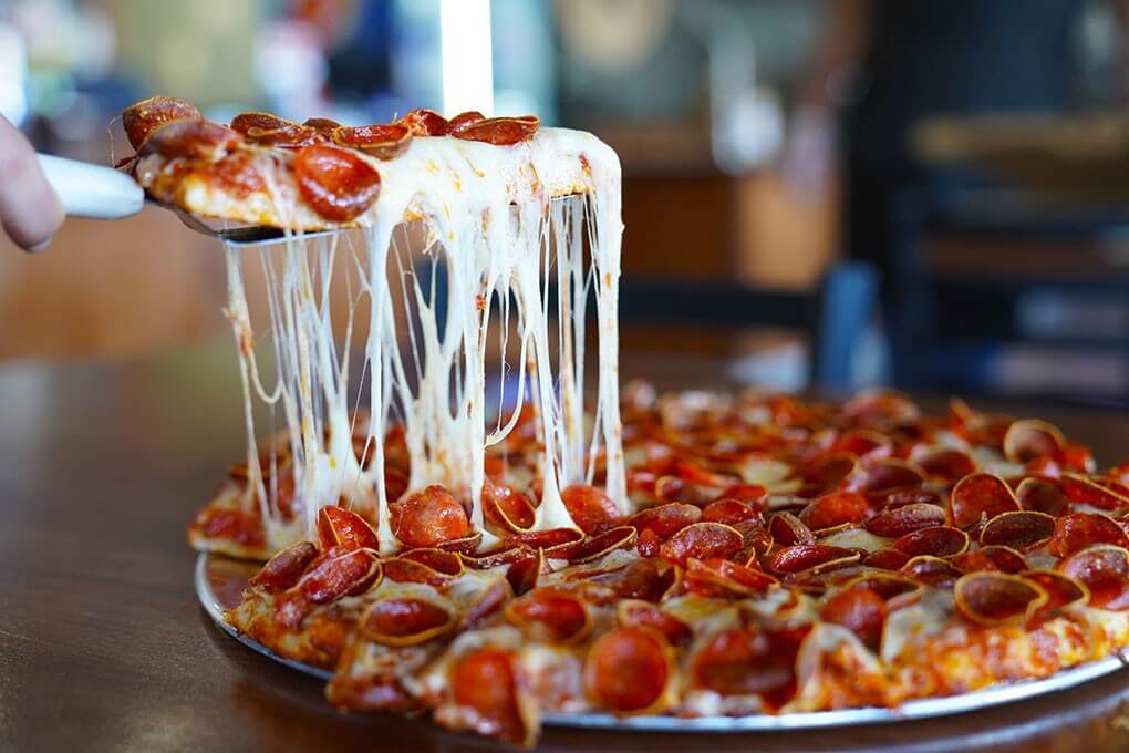 Signature pepperoni on housemade dough with tomato sauce and whole-milk mozzarella