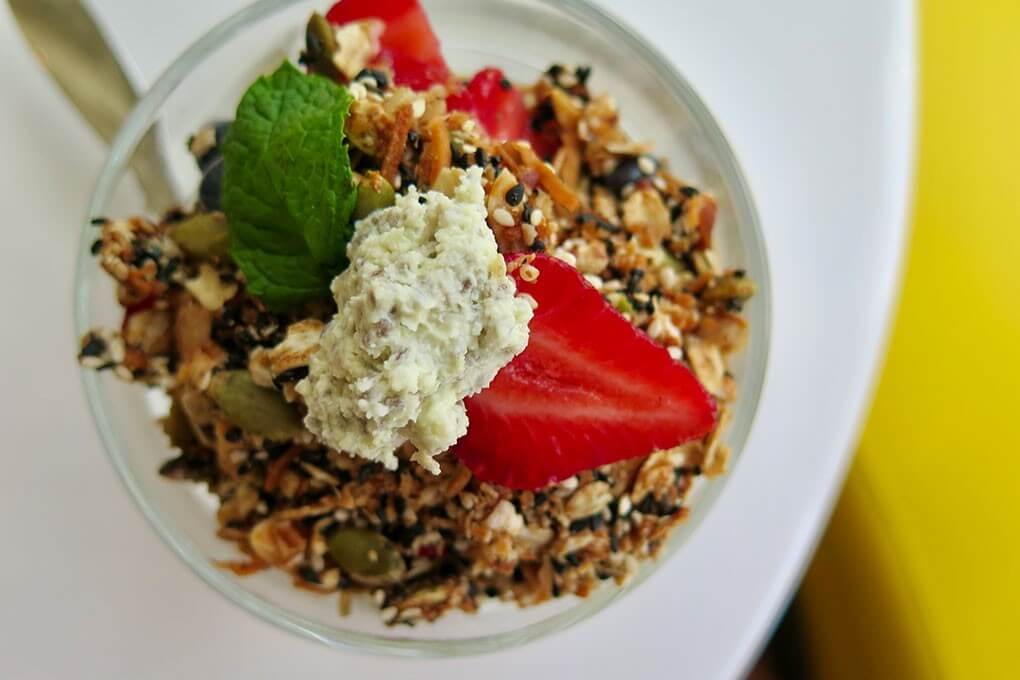 Chia-Lime Pudding with black sesame-coriander granola, passionfruit curd and macerated raspberries