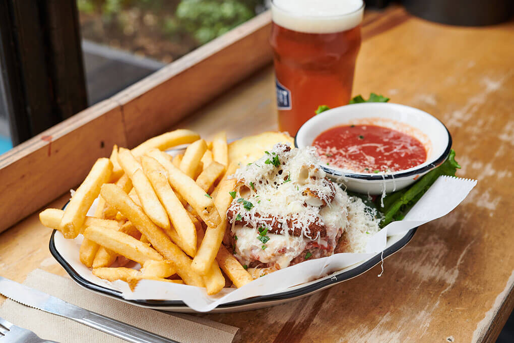 Pizza Burger with marinara sauce, fried mozzarella and shaved Parmesan