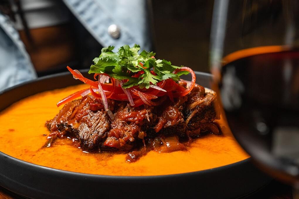 Short Rib Ropa Vieja with roasted red pepper sauce