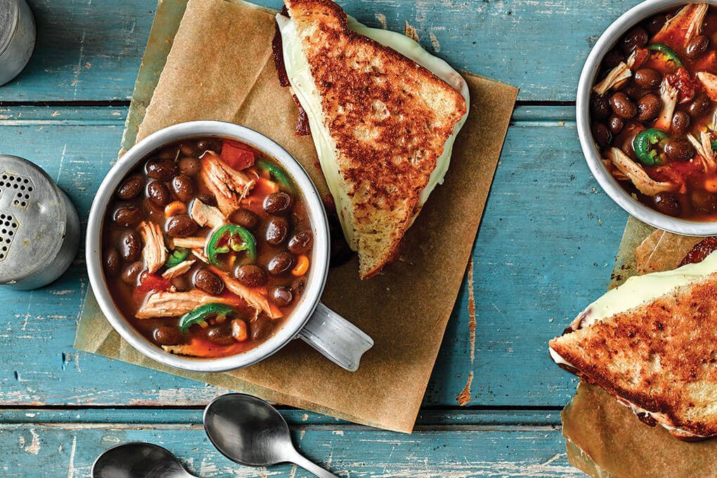 Starting with Bush’s Best® Easy Entrée® Taco Fiesta Black Beans provides this Spicy Black Bean Tortilla Soup with the savory, complex flavors that make it such a soul-satisfying classic.
