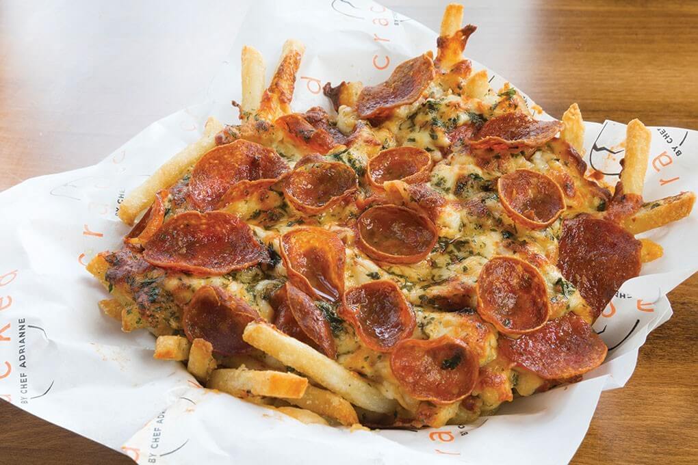 Truffled pepperoni pizza fries with marinara and Mornay sauces.
