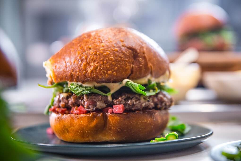 Stephanie Izard, Executive Chef/Owner of four Chicago restaurants, including Girl & the Goat, features a blend of ground beef and shiitakes in her Blended Burger.