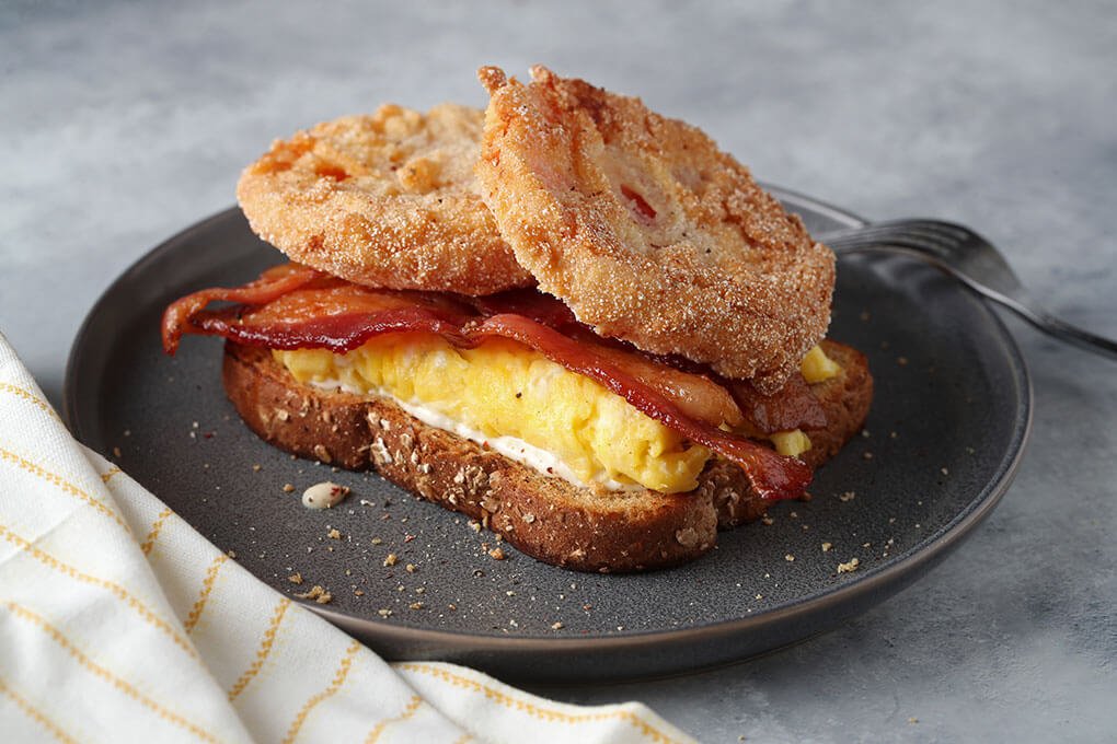 Janet Kirker’s Fried Green Tomato and Bacon Sandwich makes smart use of Smithfield’s Ready to Eat Bacon, freeing up kitchen prep time for the other elements of this fun take on the beloved BLT.