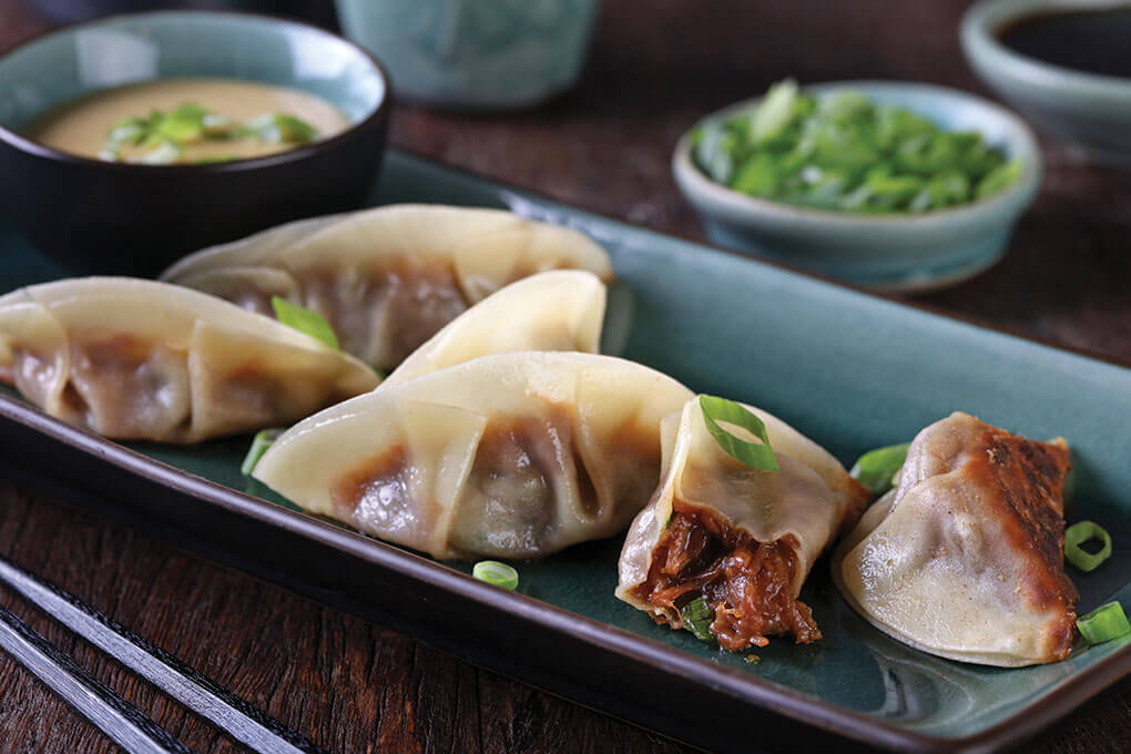 Mongolian-Style Beef Dumplings feature Smithfield Smoke’NFast Pot Roast, already perfectly braised, says Janet Kirker. She signaturizes it with ginger, garlic, soy sauce and brown sugar, tucking the meat into dumplings and serving them with a biting mustard dipping sauce.