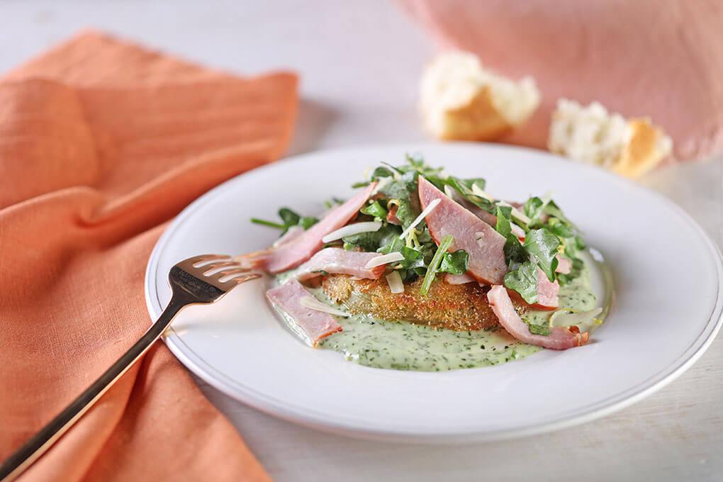 Banas uses Smithfield Hickory Smoked Ham as a savory, meaty contrast to the green goddess, watercress and fried green tomatoes.