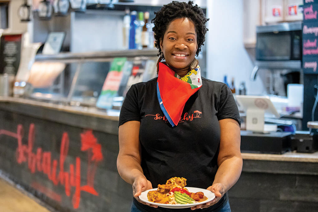 Chanel Fleurimond, co-owner of Sobeachy Haitian Cuisine at Baltimore’s Cross Street Market, steps out from behind the counter and engages with her customers, answering questions and offering samples. That tactic has proven successful, encouraging discovery and building a sense of community.