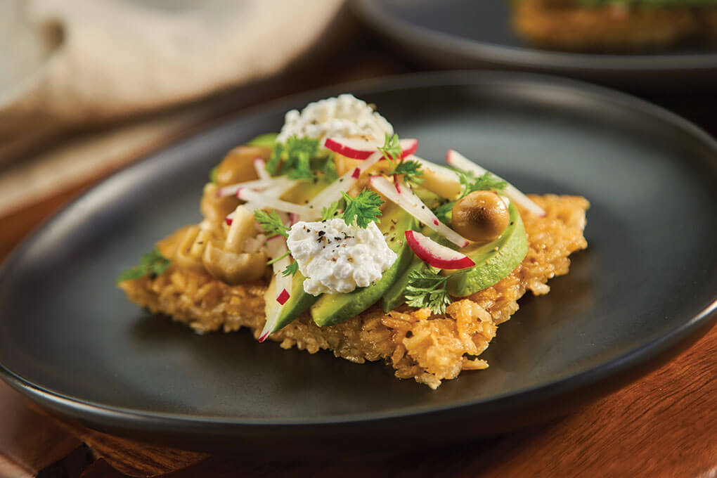 Using crispy, pressed brown rice for the base of this Brown Rice Avocado Toast is a fun way to update a brunch classic.