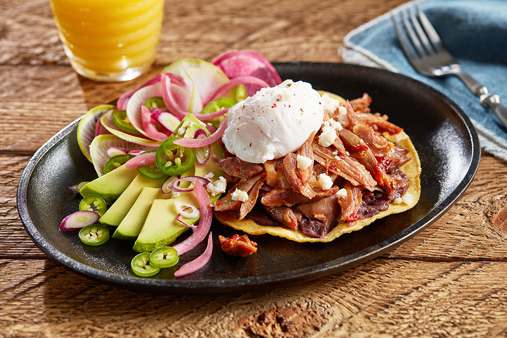 Earthy and smoky lamb tinga, topped with pickled red onions, queso fresco, Mexican crema and a perfectly poached egg.