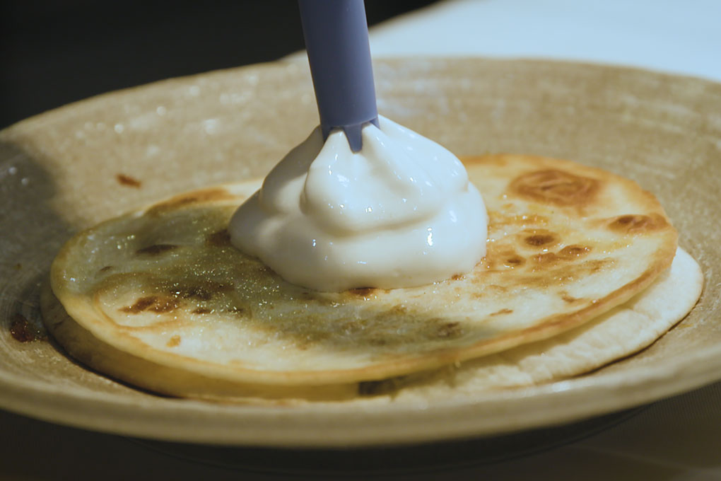 Chef Akhtar Nawab gives a unique twist to a quesadilla in the form of a creamy dollop of California Crema, Queso Oaxaca and Burrata piped atop.