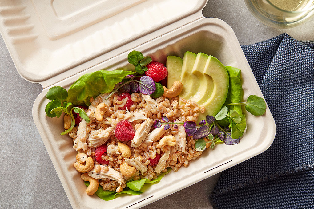 Chef Jennifer Etzkin O'Brien creates a craveable and energizing salad from farro, warm roasted chicken, bright raspberries and crunchy cashews.