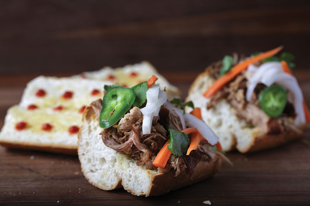 Hard seltzer hybrids are ideal partners with snackables, lunch and brunch fare, like this Pork Shoulder Banh Mi, starring pulled pork, pickled daikon and carrot, along with a spike of Sriracha.