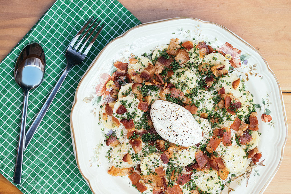 Agnes Restaurant in Pasadena, Calif., features an artisan cheese in a clever play on a classic appetizer. The Loaded Baked Potato Ravioli stars crispy pancetta, broccoli relish, cheddar, chives and crème fraîche.