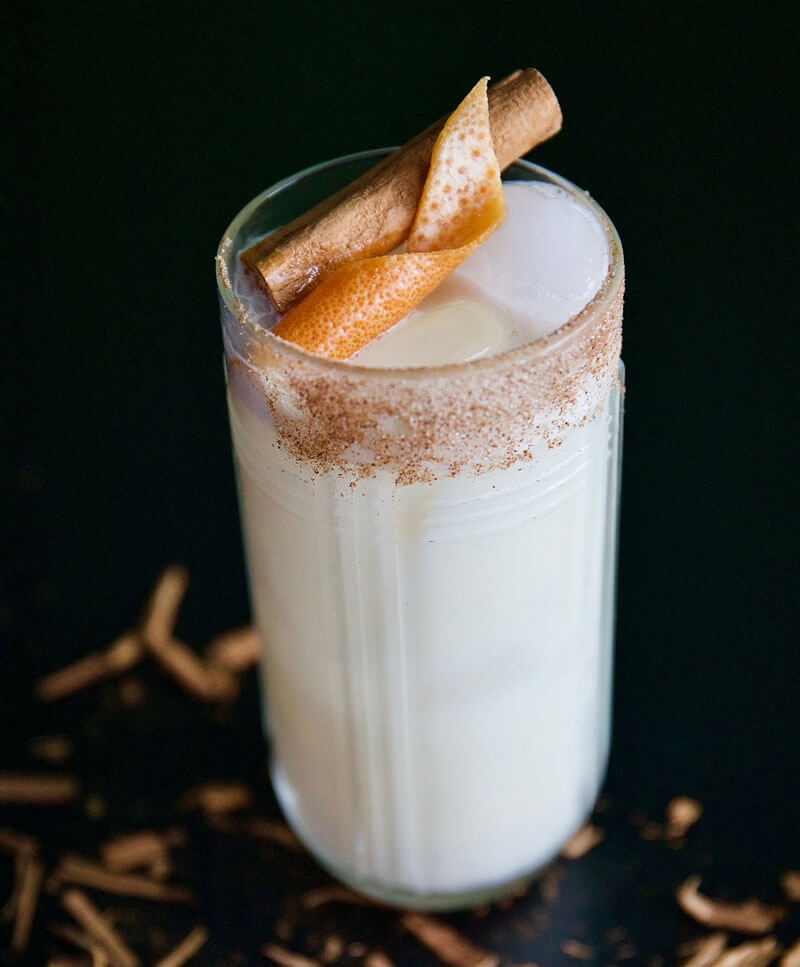 Tony Pereyra’s Meet Me at the Playa cocktail features horchata, coconut-infused rum, orange blossom water and chicory-pecan bitters and is served with orange peel, a cinnamon stick and a cinnamon-sugar rim.