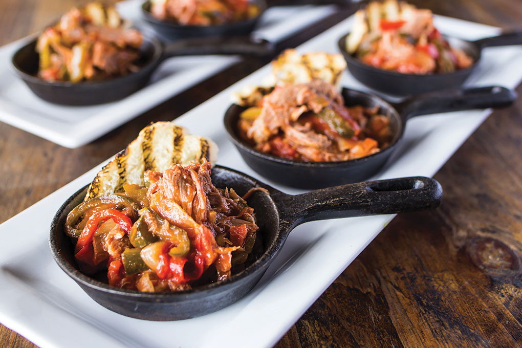 This Basque Piperade with braised lamb shoulder transforms a regional classic from the mountains of Spain and France into a hearty small plate.