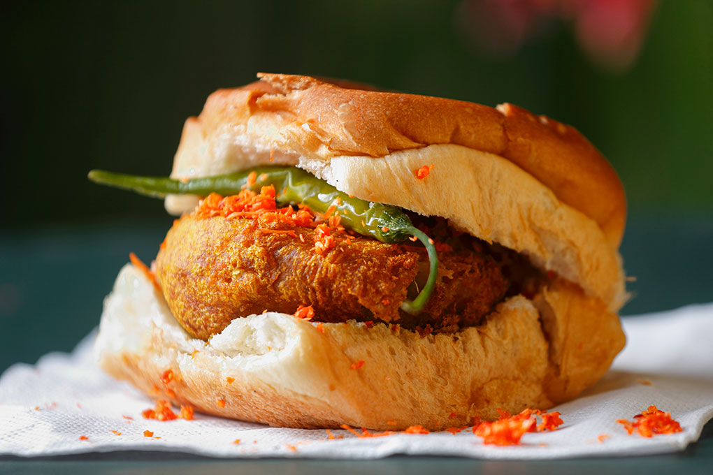 A fast-food version of vada pav, this Indian street food snack stars a crispy battered potato sandwiched in a soft bun with chutney and chile pepper. Here, the potato is given a Nashville hot treatment, dipped in chile oil, then battered and fried. As more consumers seek out convenient, craveable snacks, approachable yet unexpected menu items like this one are poised to win.
