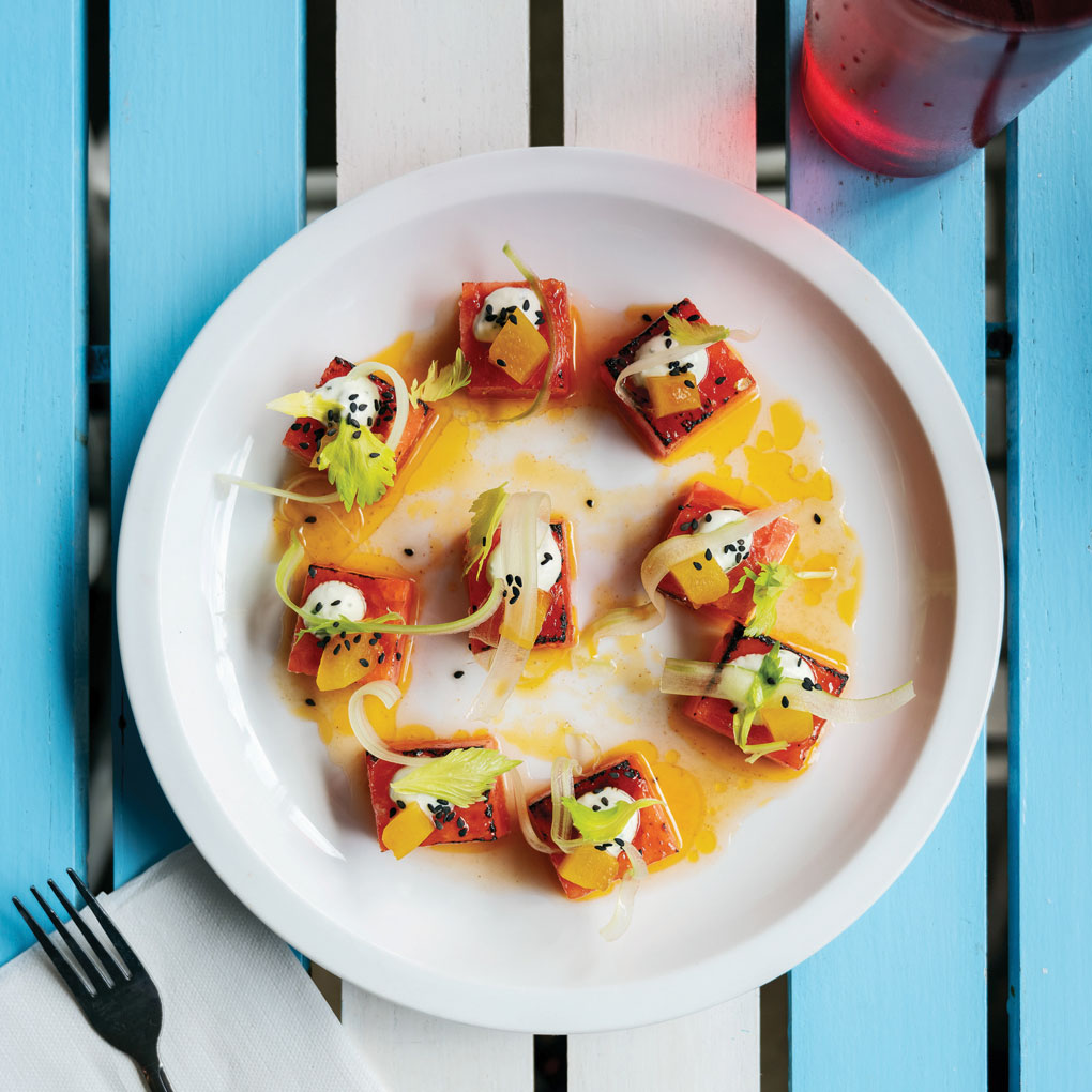 Big flavor moves can come in small packages: This Charred Watermelon Salad features an ancho chile vinaigrette, whipped feta and turmeric-pickled watermelon rind.