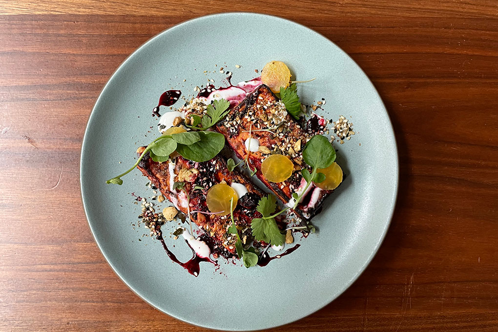 At globally themed Proxi in Chicago, Andrew Zimmerman features Coal-Roasted Paneer as an appetizer, served with beet-tamarind chutney and cashew-curry leaf dukkah.