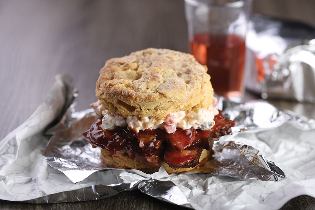 Chef Nick Karoly’s Smoked Brisket Biscuit, with black garlic barbecue sauce and jalapeño pimento cheese offer both spice and funk—ideal counterpoints to Thai iced tea’s sweet, aromatic tones.