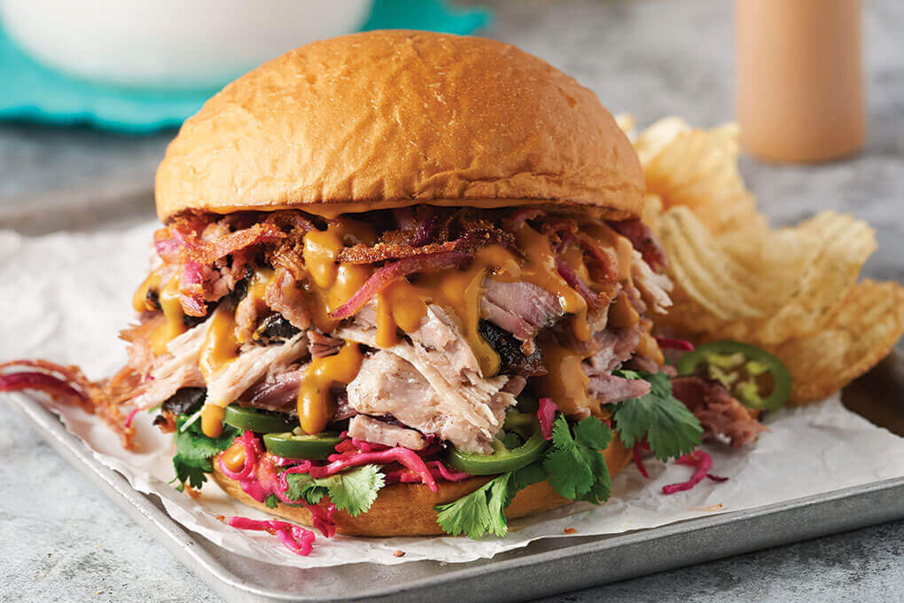 Ol’ Carolina on King’s Hawaiian Original Little Island Burger Buns. The King’s Hawaiian Original Little Island Burger Buns deliver a uniquely soft, fluffy texture with just a touch of sweetness. The sweet flavor profile enhances this Carolina-style pulled pork sandwich.