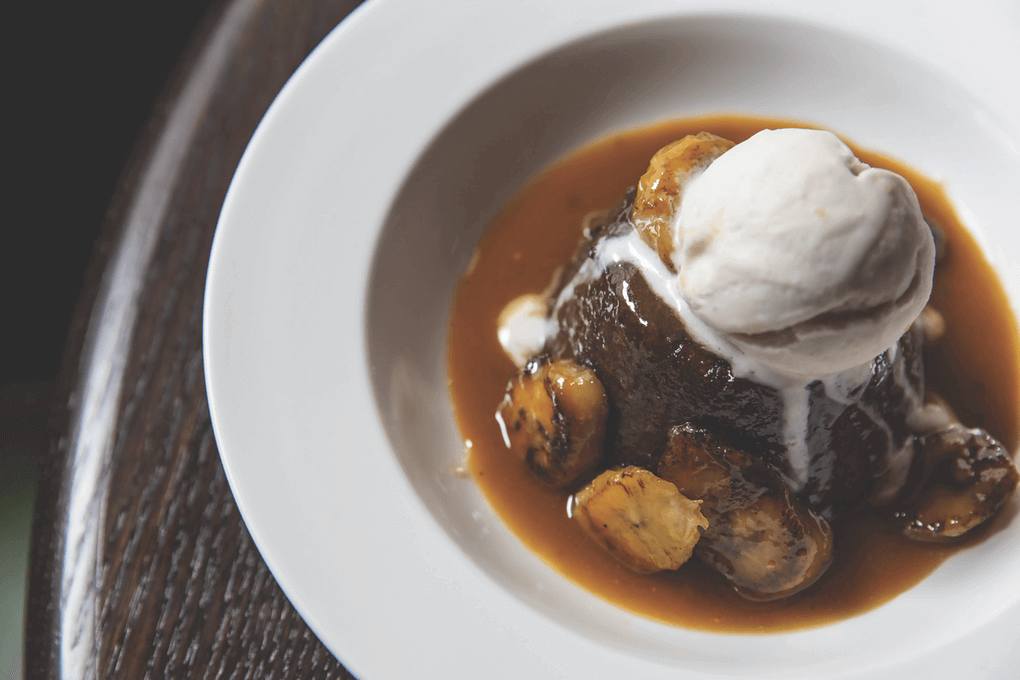 Jack & Charlie’s 118 in New York menus a Sticky Toffee Bread Pudding with a rum-butterscotch sauce and roasted banana ice cream.