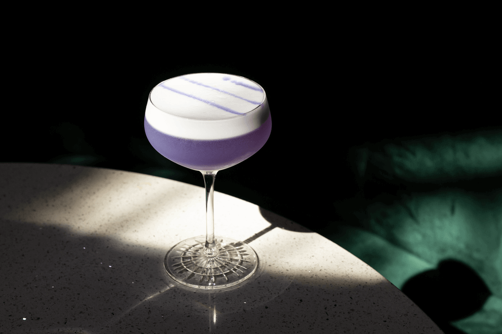 Beverage director Ivo Diaz uses a banana simple syrup to bring a touch of sweetness to the Purple Banana Cocktail at Casa Ora in Brooklyn, N.Y. The drink also includes tequila, dry vermouth and butterfly pea tea for color.