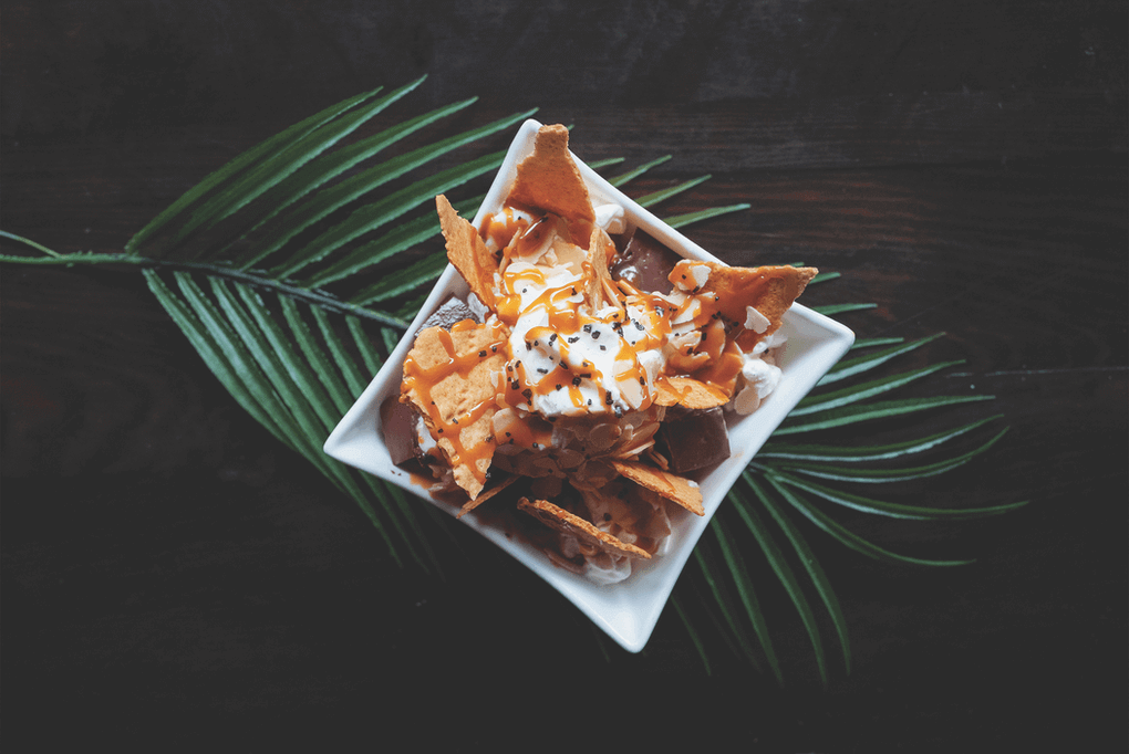 Noreetuh tempts diners with its Chocolate Haupia Sundae featuring housemade graham crackers, toasted almonds, coconut ice cream and Hawaiian black salt.