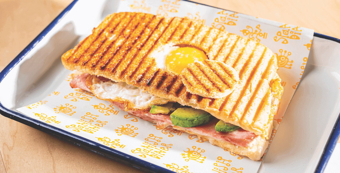 Spanish Diner’s breakfast bocata Bikini 'Angel Muro se fue a Mexico' features cooked ham, cheese, avocado and a fried egg.