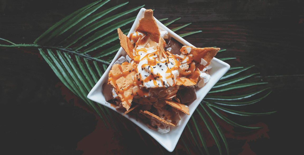 Noreetuh tempts diners with its Chocolate Haupia Sundae featuring housemade graham crackers, toasted almonds, coconut ice cream and Hawaiian black salt.