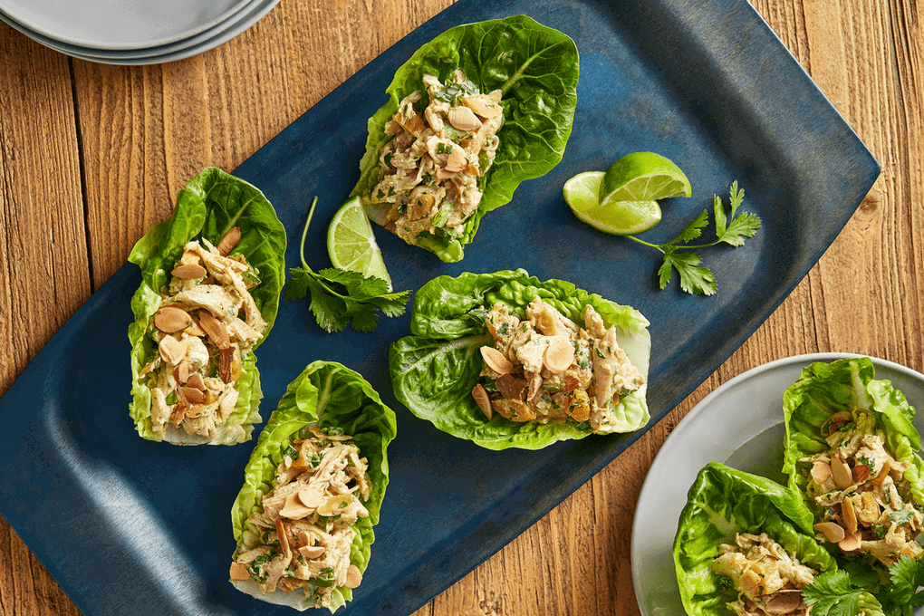 This Moroccan-inspired chicken salad features Greek yogurt seasoned with cinnamon, ginger, cumin, allspice and turmeric tossed with Tyson Low Sodium Pulled Chicken, diced dried apricots, green onions and is garnished with fresh parsley, cilantro and toasted almonds.