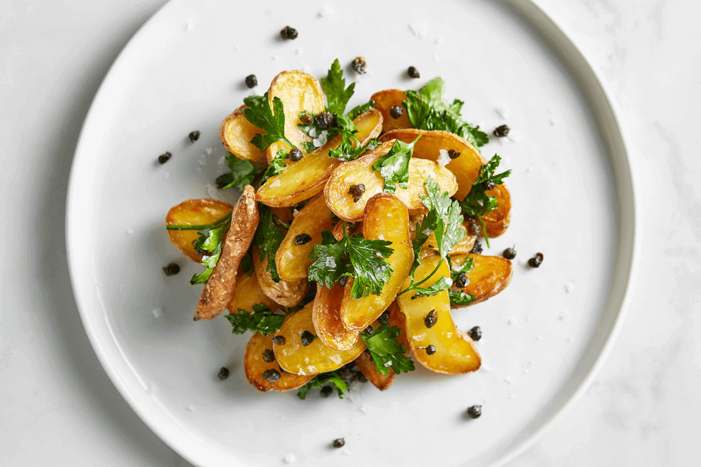 Picture for Schmaltz Roasted Idaho® Potatoes with Crispy Capers and Parsley