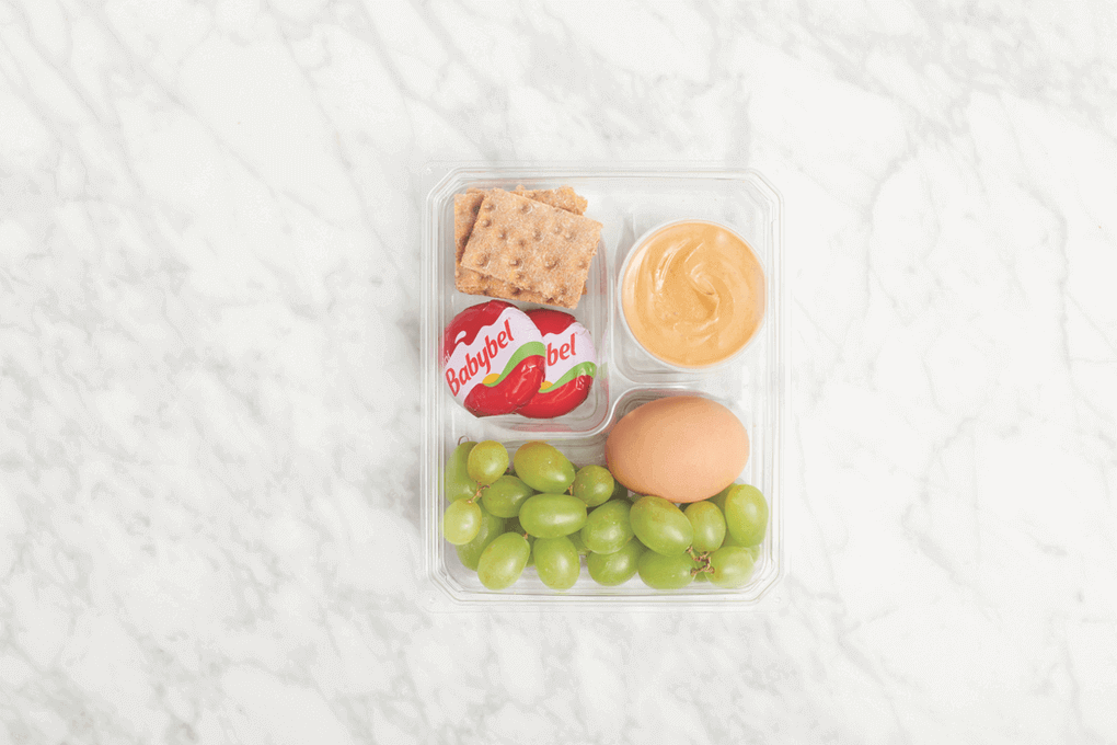 Mini Babybel cheese makes a great centerpiece for innovative to-go snack boxes. 