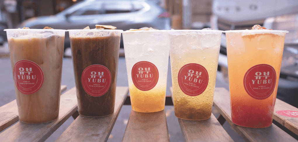 Yubu serves up housemade Dalgona candy pieces for its almond “milk” tea drinks