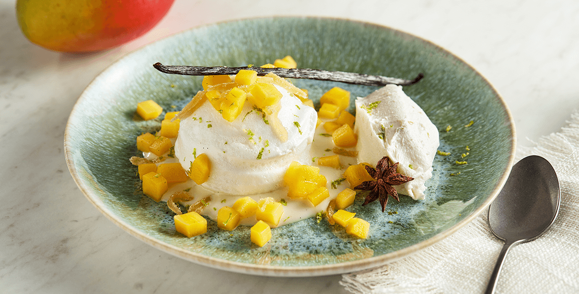 Poached Mango with Lemongrass Crème Anglaise and Coconut Sorbet